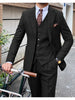 Sophisticated men's textured three-piece suit with paisley tie and pocket square, showcasing refined urban style